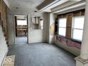Renovation project: A living room with exposed wood floors, walls and ceilings at 2729 Columbia Ave, Indianapolis, IN 46205