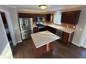 Modern kitchen with stainless steel appliances and hardwood floor at 6663 Trailside Dr, Avon, IN 46123