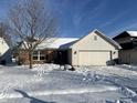 Ranch style home with a white exterior, red shutters, and a two-car garage at 837 Trotter Ct, Greenwood, IN 46143