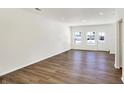 Bright living room featuring hardwood floors and neutral walls at 19456 Northwest Dr, Westfield, IN 46074