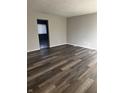 Spacious living room featuring wood-look flooring at 2450 Morning Star Dr, Indianapolis, IN 46229