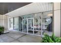 Glass doors entrance to building with modern signage at 3965 N Meridian St # Apt 6C, Indianapolis, IN 46208