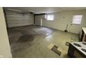 Spacious garage with overhead door and storage cabinets at 1801 W Morris St, Indianapolis, IN 46221