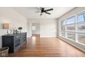 Spacious living room featuring hardwood floors and large windows at 2521 Cicero Rd, Noblesville, IN 46060