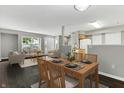 Cozy, open floor plan features a formal dining area that flows into the living room and kitchen at 4652 Kimmeridge Ln, Indianapolis, IN 46254
