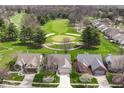 Stunning aerial view of homes overlooking a lush green golf course at 4842 Ashbrook Dr, Noblesville, IN 46062