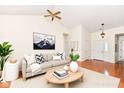 Bright living room with hardwood floors and neutral decor at 4842 Ashbrook Dr, Noblesville, IN 46062
