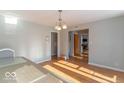 View of hardwood floor dining room and hallway at 502 W 38Th St, Indianapolis, IN 46208