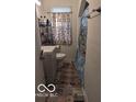 Clean bathroom with shower/tub combo and window at 5708 N Keystone Ave, Indianapolis, IN 46220