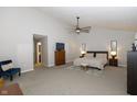 Spacious main bedroom featuring a ceiling fan, neutral walls, and ample natural light creating a serene and inviting atmosphere at 6595 Reserve Dr, Indianapolis, IN 46220