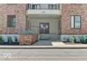 Building entrance with steps and brick facade at 721 E North St # 1B, Indianapolis, IN 46202