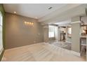 Open concept dining room with neutral walls and carpeting at 8640 Lantern Farms Dr, Fishers, IN 46038