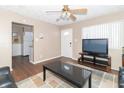 Living room with view of kitchen and TV at 1704 Nelson Ave, Indianapolis, IN 46203