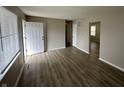 Bright living room featuring wood-look floors and an open layout at 4219 E 43Rd Ct, Indianapolis, IN 46226