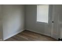 Bright bedroom with hardwood floors and neutral walls at 555 N Oakland Ave, Indianapolis, IN 46201