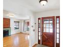 Bright entryway with hardwood floors and view into living room at 6072 Meridian St W Dr, Indianapolis, IN 46208