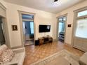 Open living room showcasing access to bedrooms and a neutral color palette at 630 E Mccarty St, Indianapolis, IN 46203
