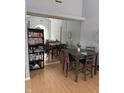 Bright dining area with a table and chairs, near a mirrored wall at 1294 Lexington Trl, Greenfield, IN 46140