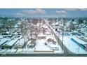 Aerial view of street, snow covered houses at 1363 & 1367 S Belmont Ave, Indianapolis, IN 46221