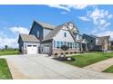 Stunning two-story home with a side-entry garage and manicured landscaping at 19452 Lewis Cir, Westfield, IN 46074