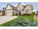 Brick two-story house with attached garage and manicured lawn at 3150 Beach Blvd, Cicero, IN 46034