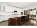 Modern kitchen with white cabinets, granite counters and island at 3150 Beach Blvd, Cicero, IN 46034