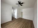 Large bedroom with light walls and wood-look floors at 1256 Kappes St, Indianapolis, IN 46221