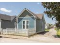 Quaint house with a white picket fence at 632 E Mccarty St, Indianapolis, IN 46203