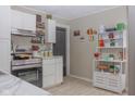 White cabinets, stainless steel appliances, and marble countertops at 1405 Sheek Rd, Greenwood, IN 46143