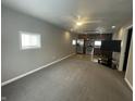 Open living room with kitchen and stainless steel appliances at 1918 Elm St, Columbus, IN 47201