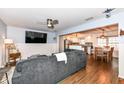 Open concept living room and kitchen with hardwood floors at 2214 Pleasant St, Indianapolis, IN 46203