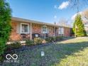 Brick ranch house with covered porch and landscaping at 3050 N County Road 950 E, Brownsburg, IN 46112