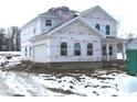 Two-story house under construction, with attached garage visible at 657 Lake Vista Dr, Columbus, IN 47201