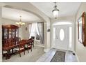 Formal dining room with a large table and hutch at 10194 E 900 N, Markleville, IN 46056