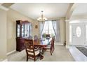 Formal dining room with wood table and hutch at 10194 E 900 N, Markleville, IN 46056