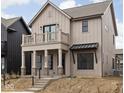 Charming two-story home featuring a balcony and covered porch, blending classic and modern design at 17363 Newton Main St, Westfield, IN 46074