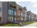 Row of townhouses showcasing modern design and landscaping at 2145 N College Ave, Indianapolis, IN 46202