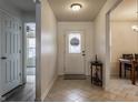 Bright entryway with tile flooring, and views into adjacent rooms at 3865 Dusty Sands Rd, Whitestown, IN 46075