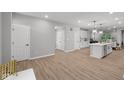 Spacious open-concept living area with modern flooring and ample natural light at 1713 Real St, Indianapolis, IN 46240