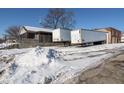 Commercial building with semi-trucks parked in front at 3324 Prospect St, Indianapolis, IN 46203