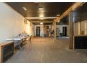 Unfinished interior with exposed beams and hardwood floors at 3324 Prospect St, Indianapolis, IN 46203