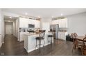 Modern kitchen with white cabinets, stainless steel appliances, and an island at 829 Stark St, Greenfield, IN 46140