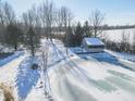 Cozy guest house with deck overlooking a frozen pond at 881 E 226Th St, Sheridan, IN 46069