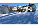 House with deck and detached shed, snow-covered yard at 1683 W State Road 42, Mooresville, IN 46158