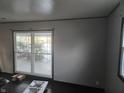 Bright living room with natural light and clean walls overlooking the backyard at 604 Gooseberry Ln, Greenwood, IN 46143