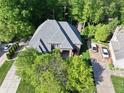 Overhead view of the home featuring a well maintained lawn and driveway at 13650 Golden Ridge Ln, Fishers, IN 46055