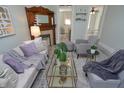Spacious living room with light walls and modern furniture at 1442 N Illinois St # 19, Indianapolis, IN 46202