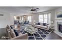 Spacious living room featuring hardwood floors, a fireplace, and ample natural light at 1715 Danielle Rd, Lebanon, IN 46052