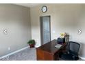 Home office with a desk, chair, and neutral wall colors at 251 Dyson Dr, Whiteland, IN 46184