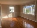 Living room with hardwood floors and neutral walls at 2610 W 18Th St, Anderson, IN 46011
